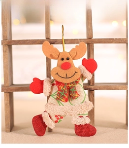 Close-up of reindeer Christmas tree ornament with red scarf and sequined boots