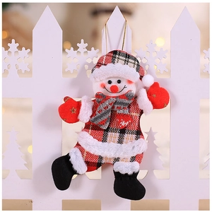 Detailed view of plush Christmas snowman ornament with red plaid fabric and furry collar