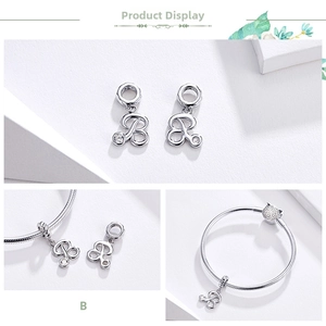 Detailed view of cursive letter B charm in S925 sterling silver with cubic zirconia
