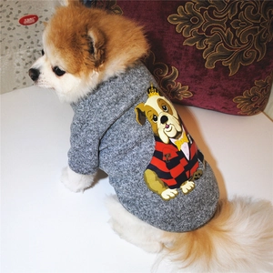 Detail view of small dog wearing grey knit fleece sweater with crown bulldog print