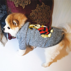 Detail of grey dog hoodie featuring a cartoon corgi print and soft knit texture