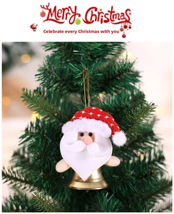 Close-up of plush Santa Claus ornament with golden bell hanging on a Christmas tree
