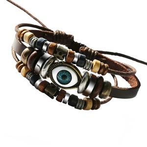 Multilayer leather braided bracelet with turquoise beads and central evil eye charm