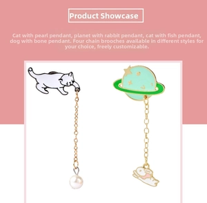 Detail of enamel cat and planet chain brooches with pearls and gold-plated finish