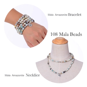 Detail of 108 Mala amazonite beads shown as both a wrap bracelet and a lotus pendant necklace