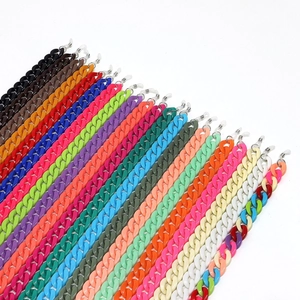 Detailed macro view of colorful acrylic eyewear chains in multiple vibrant candy colors