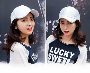 Detail of white camouflage baseball cap with breathable fabric shown on a female model