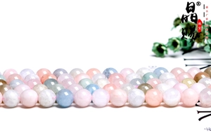 Macro shot of natural pastel morganite round beads for DIY jewelry making