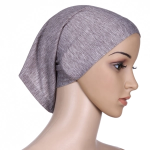 Close-up profile of a gray-purple mercerized cotton inner hijab cap on a mannequin