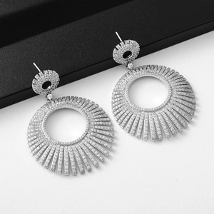 Elegant silver long tassel sunburst drop earrings with sparkling white cubic zirconia