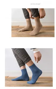 Detailed close-up of ribbed cuffs on khaki and blue cotton crew socks for men