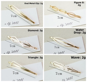Detail view of six geometric gold metal hair clips with lengths and weight measurements