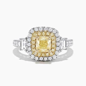 Anello di lusso con diamante giallo taglio cushion, doppio halo e pietre laterali
