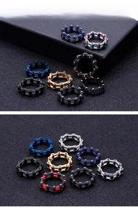 Macro view of industrial style mechanical chain rings in various colors and metallic finishes