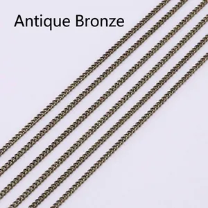 Detailed close-up of parallel antique bronze metal chains with dense link structures