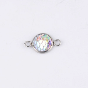 Detailed view of 10mm rainbow mermaid scale pendant with stainless steel double loops