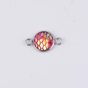 Detail of 10mm round mermaid scale cabochon pendant with double silver connector rings