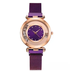 Detail of purple dial watch with rose gold case and magnetic Milanese mesh band