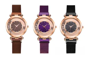 Detailed view of fashion quartz watches with moving crystals and magnetic mesh bands
