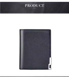 Detail of black litchi texture leather wallet with elegant silver metal buckle