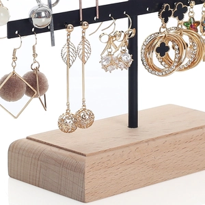 Black metal jewelry organizer with solid wood base for earrings and studs display