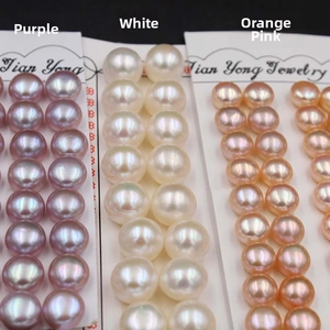 Detailed macro view of natural freshwater bread pearls in purple, white, and coral pink
