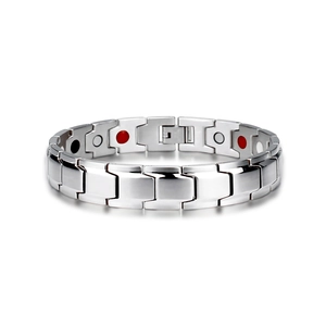 Polished silver magnetic chain bracelet featuring unique links with black and red circular inserts