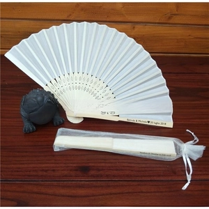 Customized white folding fan with wooden ribs and matching organza drawstring gift bag