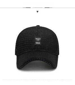 Front view of black mesh baseball cap with embroidered square brand patch on peak