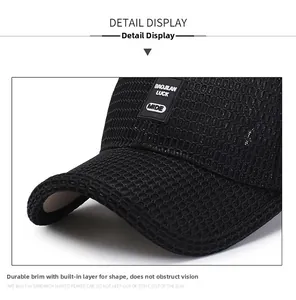 Close-up of a breathable black mesh baseball cap showing textured fabric and a durable brim