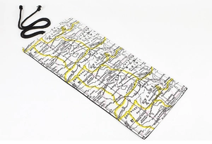Detail view of Bhutan map print on a canvas pencil roll wrap with black tie closure