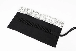 Detail showing inner elastic slots and whale print on canvas roll pencil wrap case
