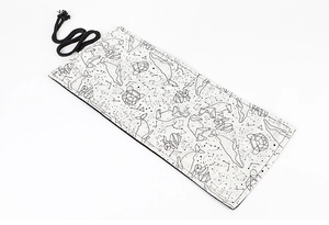 Detail showing printed canvas roll pencil case with geometric animal constellation pattern