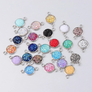 Detailed top view of 10mm stainless steel drusy connectors in various vibrant resin colors