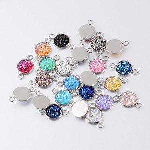 Close-up of 10mm stainless steel drusy connectors in various vibrant colors for DIY jewelry