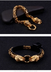 Close-up of golden Byzantine chain bracelet featuring detailed lion head relief and spring clasp