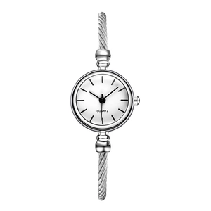 Detailed view of silver quartz watch with minimalist white dial and woven steel bangle band