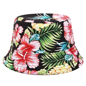 Reversible bucket hat with black floral tropical hibiscus print and wide brim for summer
