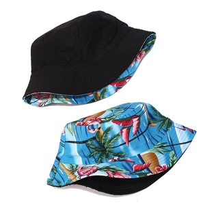Reversible bucket hat for women with black solid and blue tropical flamingo print