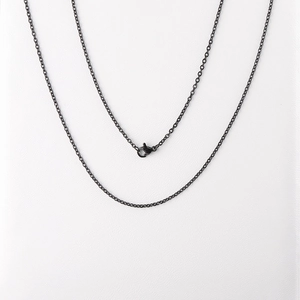 Minimalist black stainless steel cable chain necklace with lobster clasp on white background