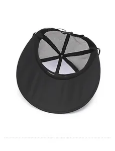 Close-up of internal stitching and breathable mesh design of the black outdoor sun hat