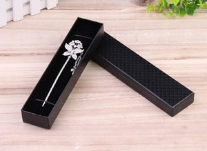Silver butterfly hairpin with tassels and rhinestones in a black jewelry box