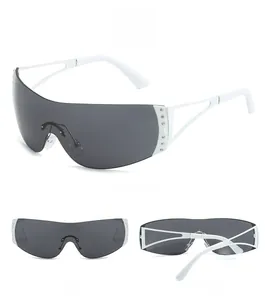 Macro detail of Y2K rimless sports sunglasses with star pattern and rhinestone accents