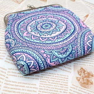 Close-up of bohemian mandala print canvas coin purse with silver kiss-lock closure
