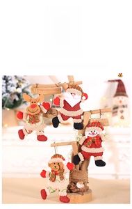 Detailed knit Christmas ornaments of Santa, deer, bear and snowman with gold hanging cords
