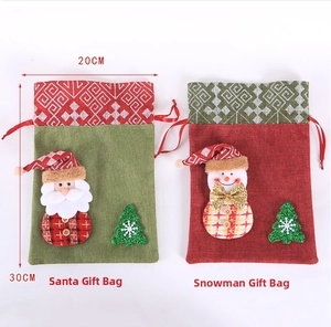 Detail of burlap Christmas gift bags with 3D Santa and Snowman patches, size 20x30cm