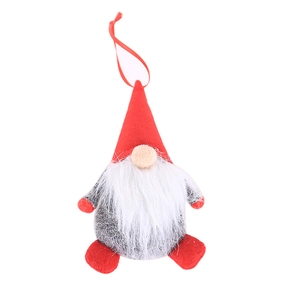 Détail d'un gnome de Noël nordique à suspendre avec chapeau rouge et longue barbe blanche