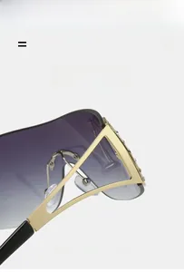 Detailed close-up of rhinestones on gold metal frame with deep purple gradient lenses