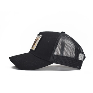 Black cotton trucker hat with eagle freedom embroidery and breathable mesh panels