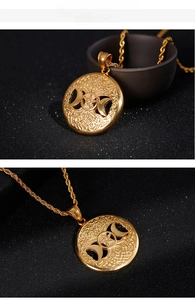Detail of gold Viking Tree of Life pendant with pentagram and moon on twist chain